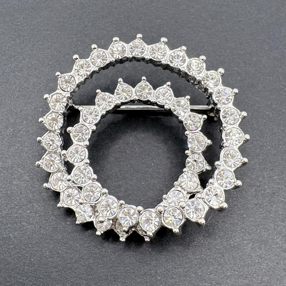 Vintage Nolan Miller Swirl Circle Brooch Silver Tone Crystal Glamour Collection